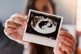 Ultrasound scan shown by woman of her child
