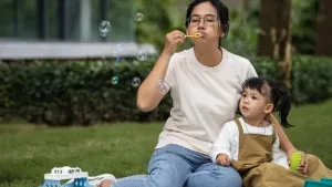 front-view-mother-girl-having-picnic Large