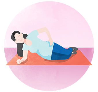 Pregnant woman lying on her side and supporting herself with elbow