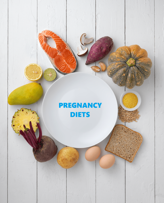 Plate surrounded by healthy food for pregnancy diet