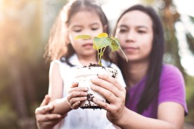 Nurture the outdoor environment with kids by gardening