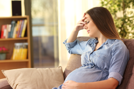 Pregnant woman experiencing morning sickness