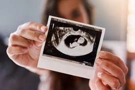 Ultrasound scan shown by woman of her child