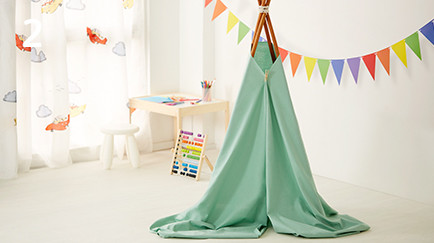 Bedsheet covering the teepee frame